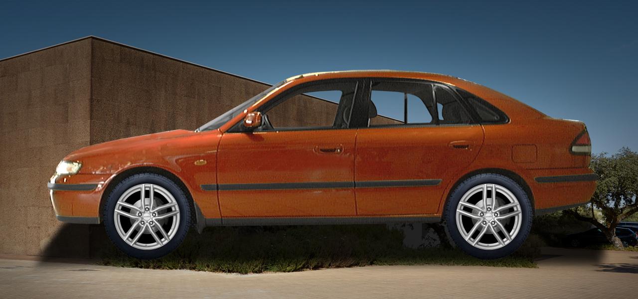 Na ilustracji: 626 (GF;GF/GW), od 1997 r. – Mazda 626, poglądowa wizualizacja auta z felgami DEZENT TR silver